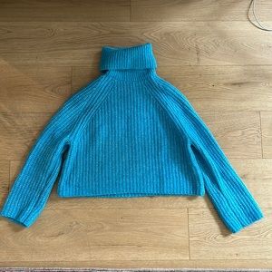 Bright neon blue crop chunky turtle neck